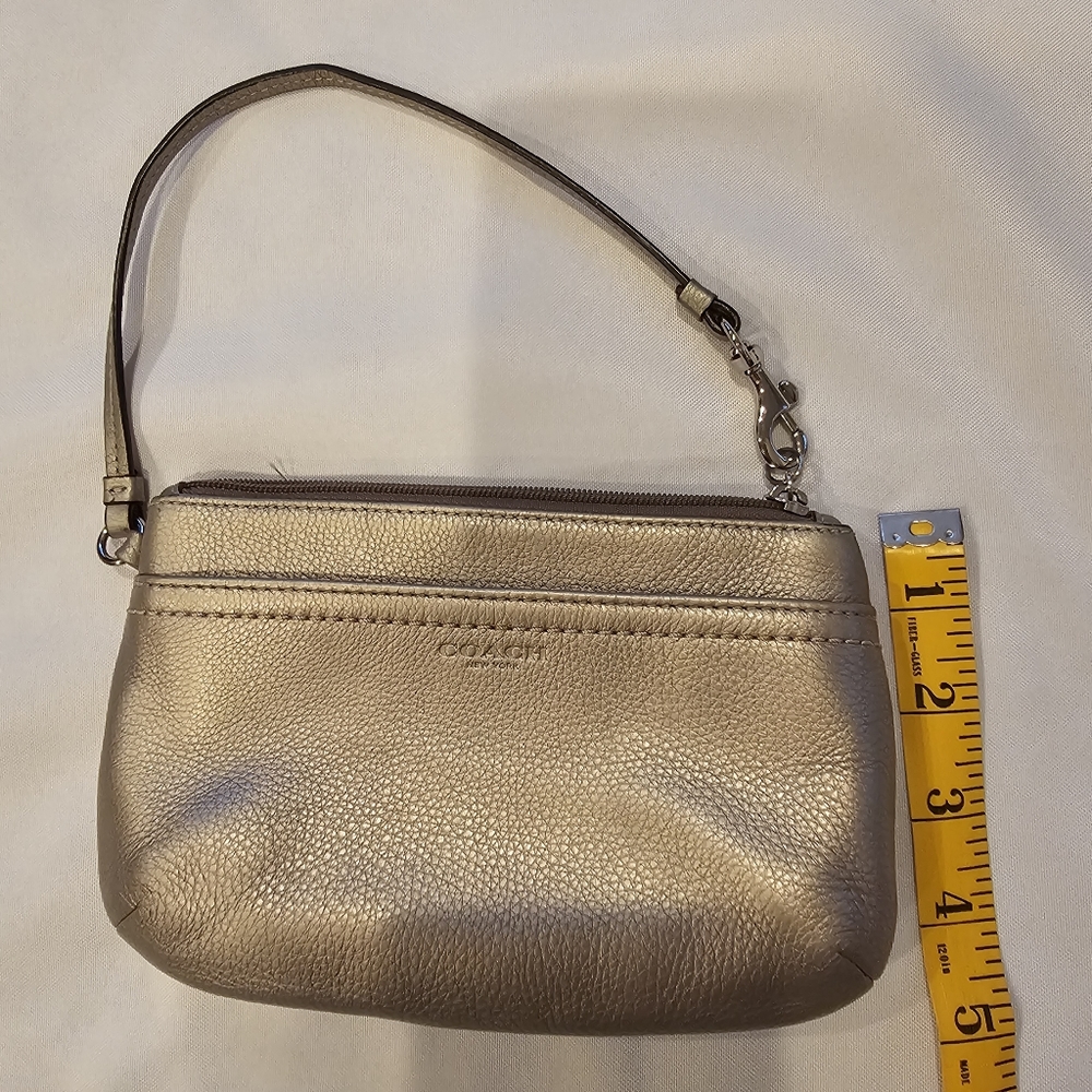 Coach wristlet gold